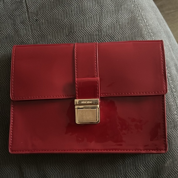 Miu Miu Handbags - MIU MIU CLUTCH 8 inch length 5 inches in height parfum Beaty line